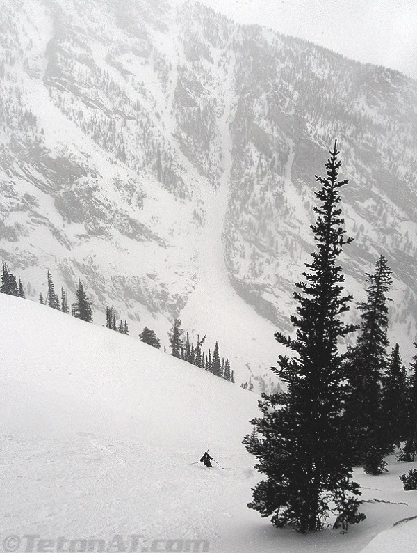 reed finlay skis in front of four hour couloir