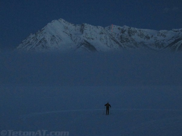 reed heads towards the fog on jackson lake